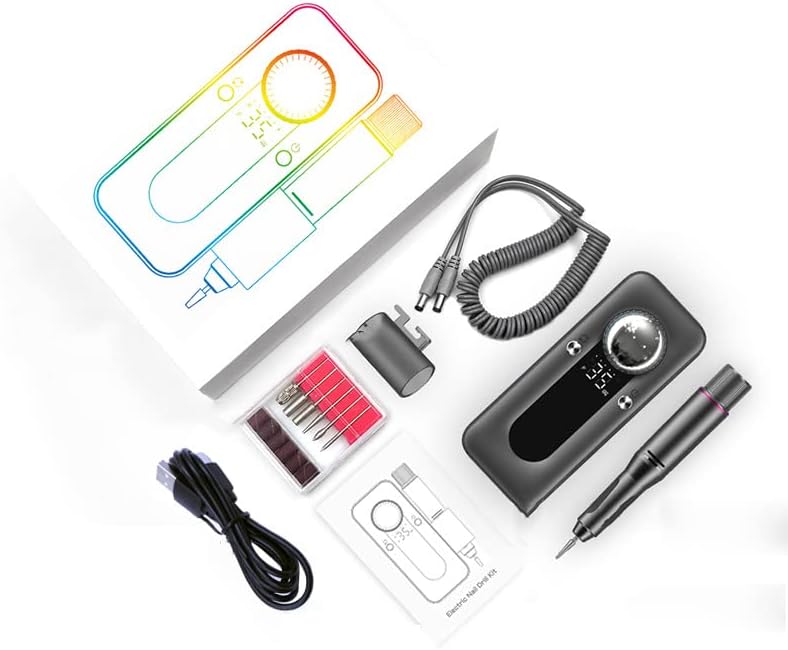 Nail drill kit with pause button feature visible on handpiece