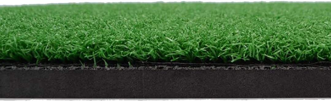 Golf practice mat used outdoors on backyard grass