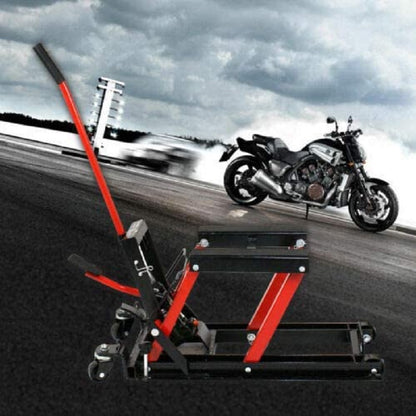 Motorcycle lifter jack in workshop setting lifting a quad bike