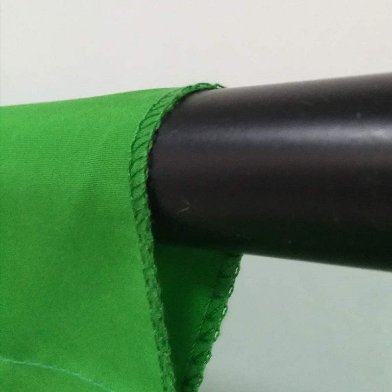 Green screen backdrop used in wedding photo shoot setup