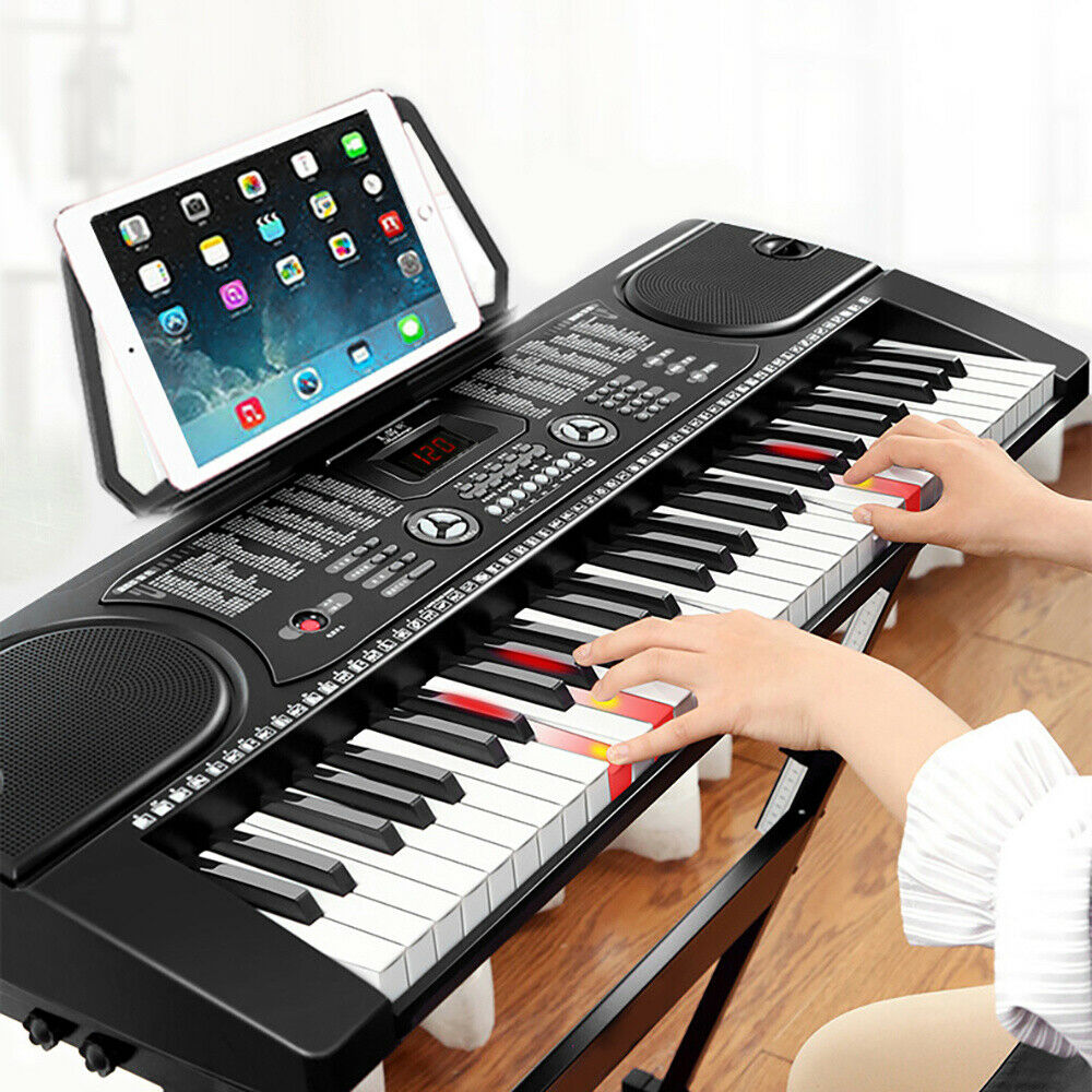 Electronic keyboard piano with music stand in natural light