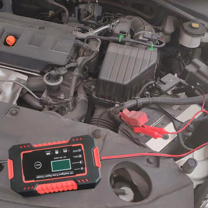 Car battery charger connected to a 12V lead-acid battery