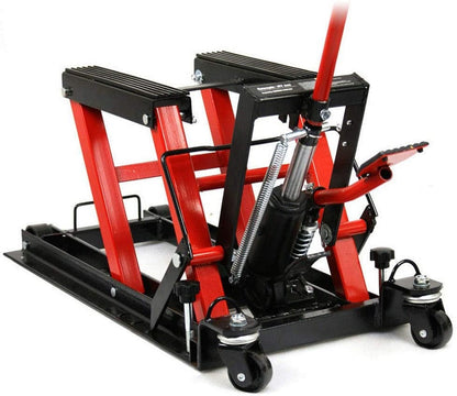 Motorcycle lifter jack in workshop setting lifting a quad bike