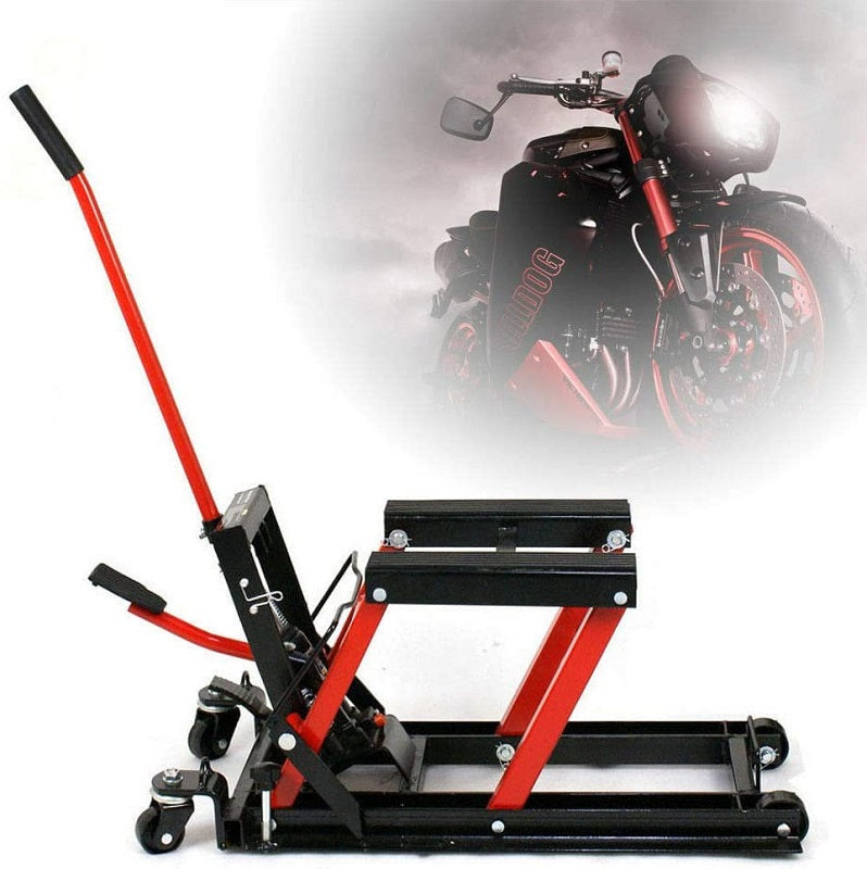 Motorcycle lifter jack in workshop setting lifting a quad bike