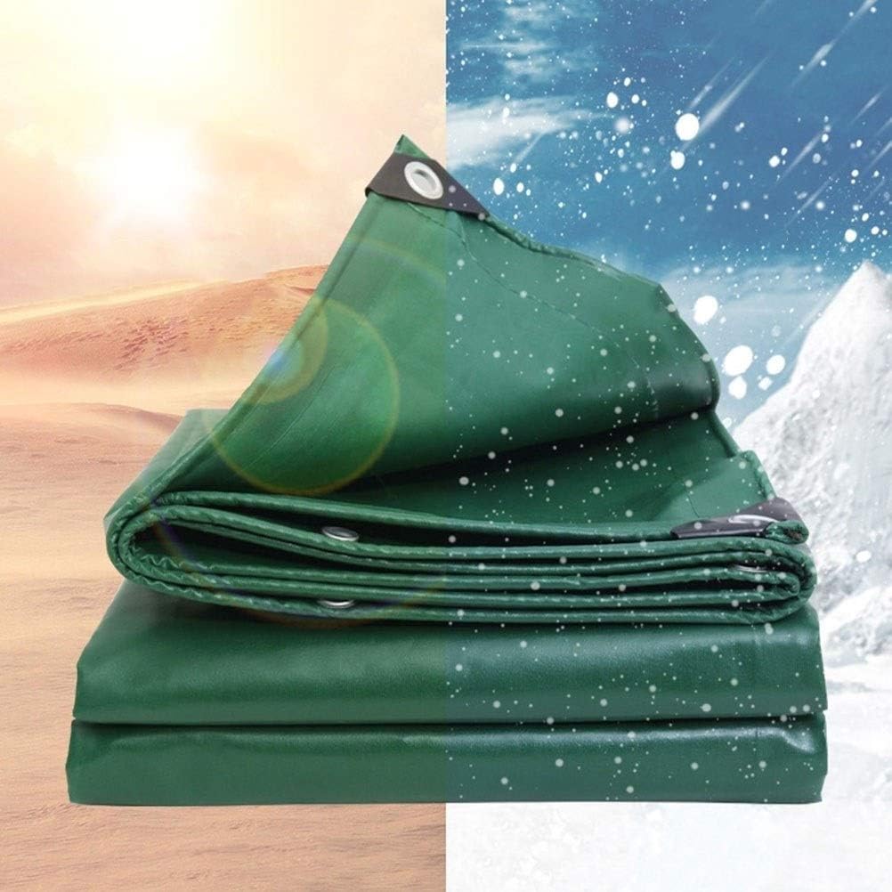 Canvas tarpaulin used as groundsheet under camping tent