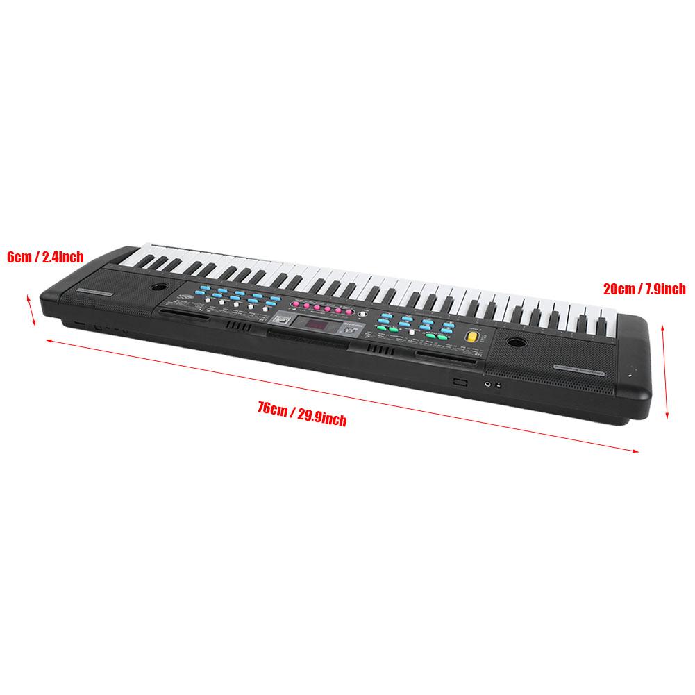 Portable electronic keyboard piano with battery compartment open