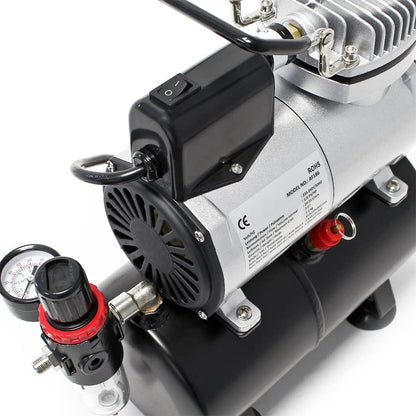 Air brush compressor with cooling fan visible at rear