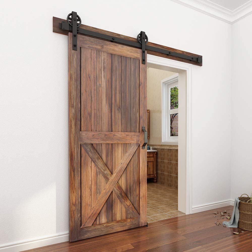 Side view of sliding barn door hardware showing track support