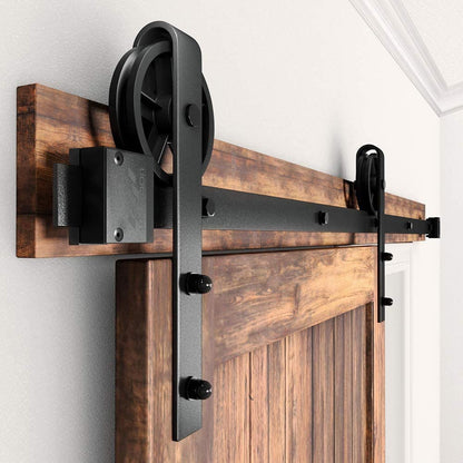 Top angle of barn door hardware hanger and door stopper