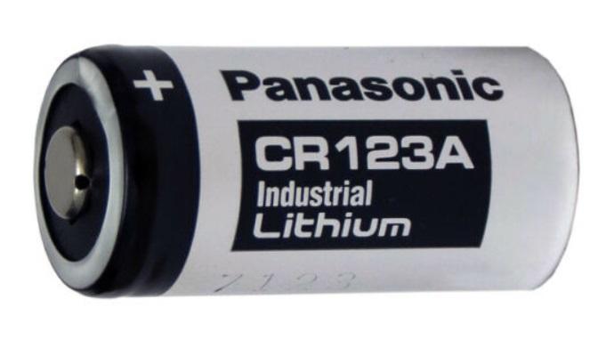 Close-up of CR123A Panasonic battery terminals