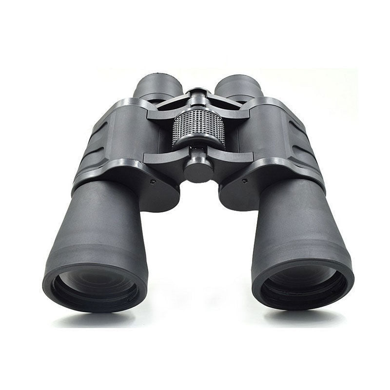 Binoculars held in hand showing compact size and weight