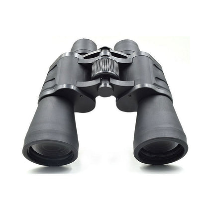 Binoculars held in hand showing compact size and weight