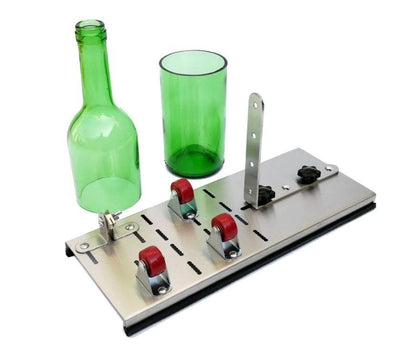Glass bottle cutter cutting a green glass bottle