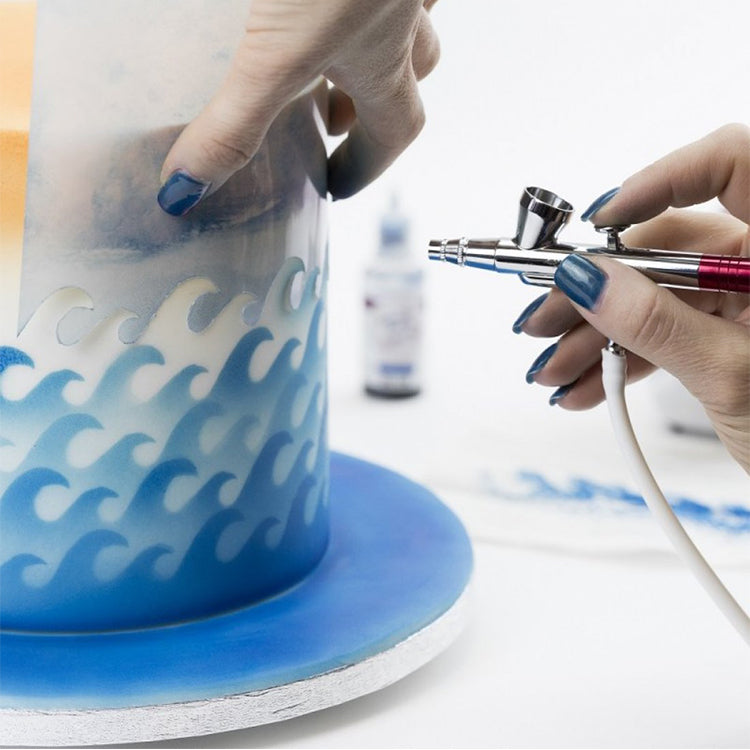 Air brush compressor showing 12V AC adapter connection