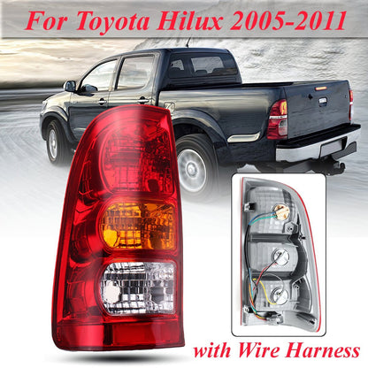 Toyota Hilux tail light left with wire harness attached