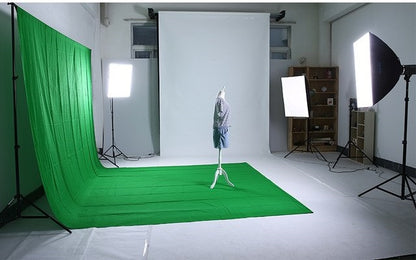 Green screen backdrop laid flat to show full 3m by 3m size