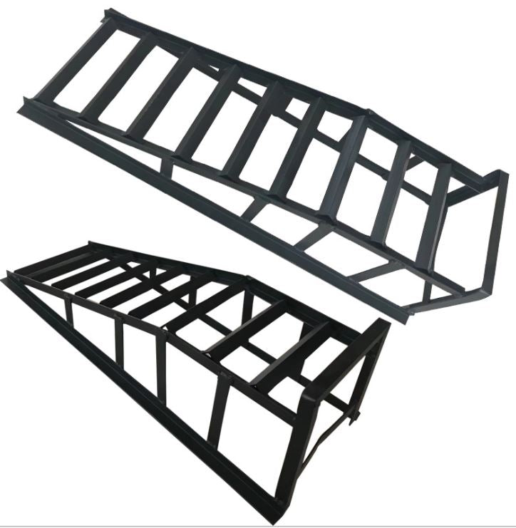 Pair of red car ramps used for vehicle maintenance