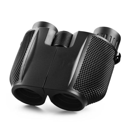 Binoculars 12x25 in hand demonstrating lightweight design