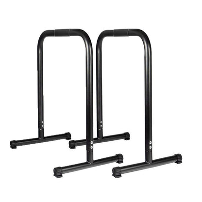User performing dips on parallel bar station dip bars