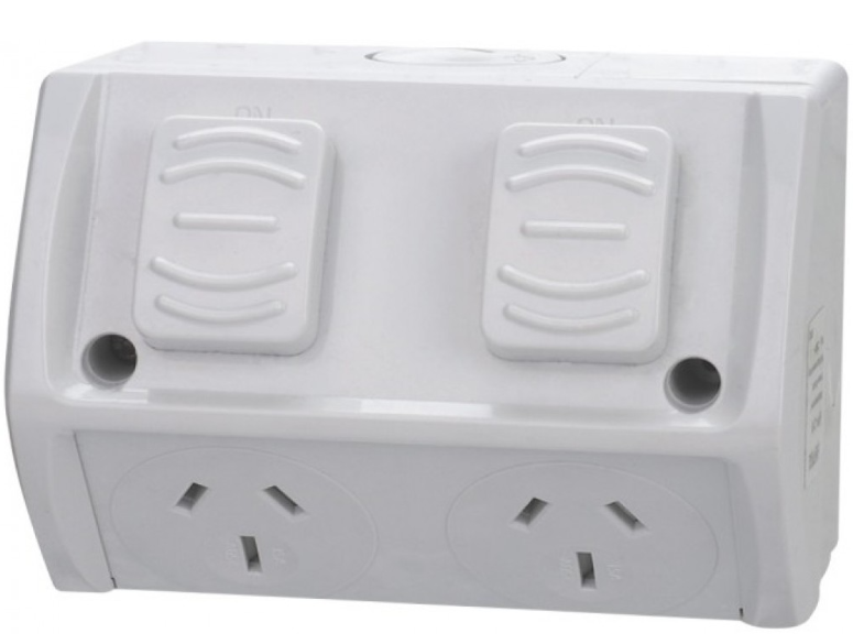 Double power point mounted on surface in outdoor setting
