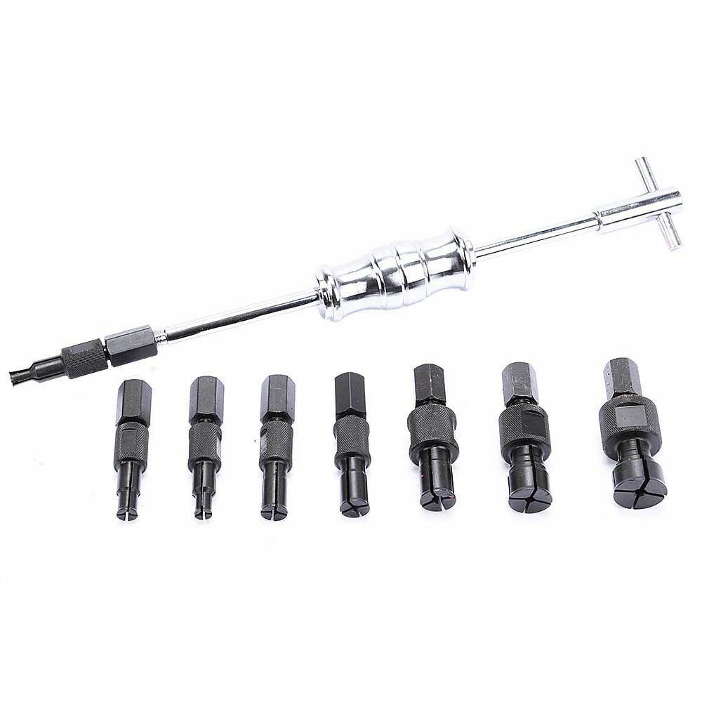 Puller set used on car bearing in a workshop setting