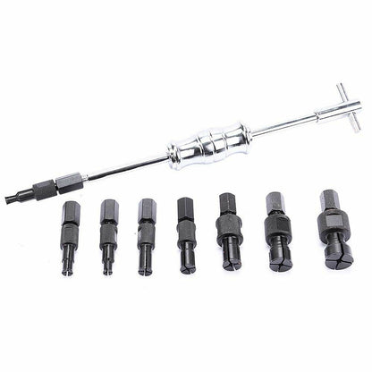 Puller set used on car bearing in a workshop setting