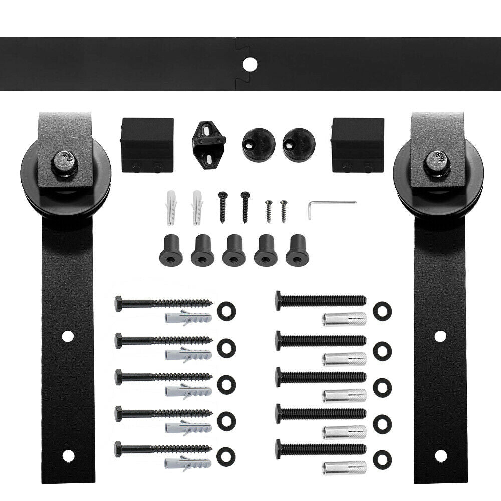 Close up of nylon wheels on barn door hardware for smooth sliding