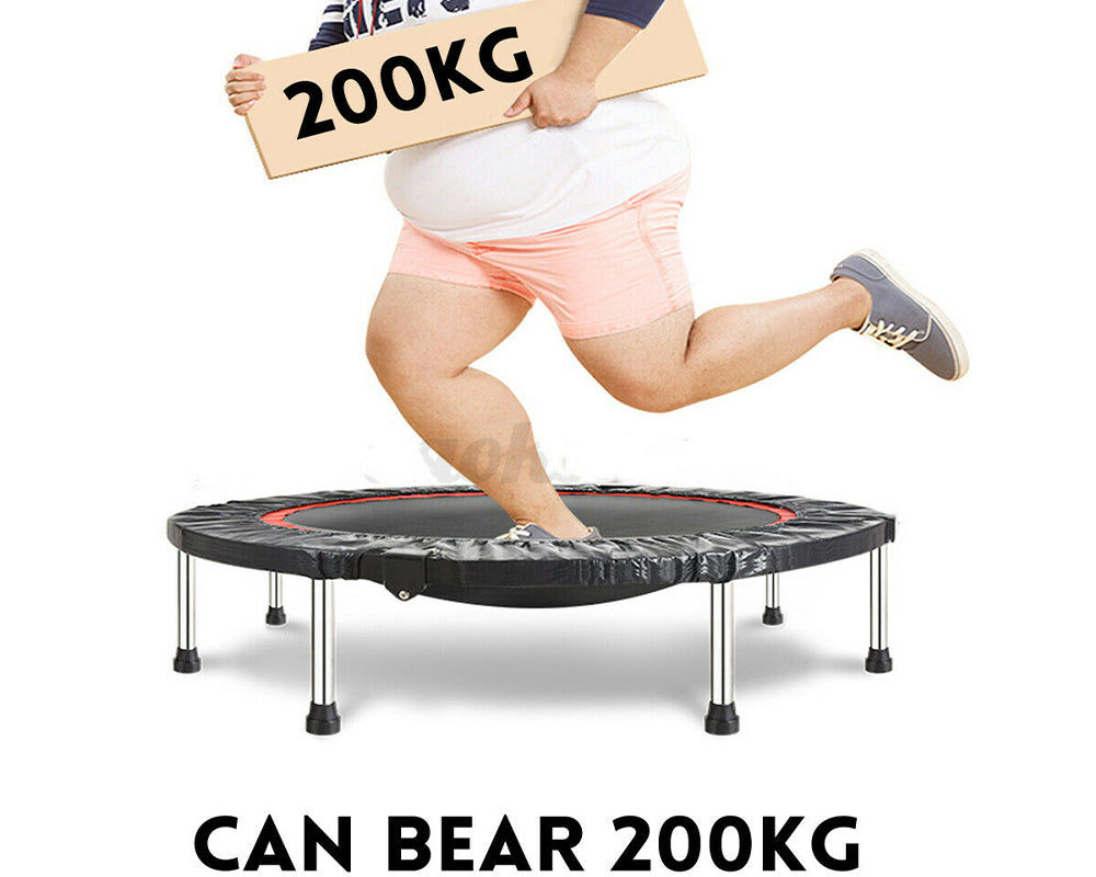 User jumping on trampoline mini foldable rebounder indoors